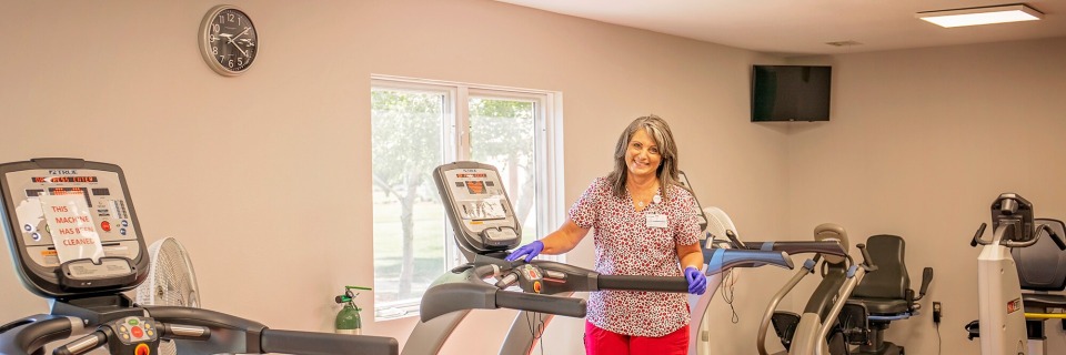 Van Buren County Hospital employee with exercise equipment.